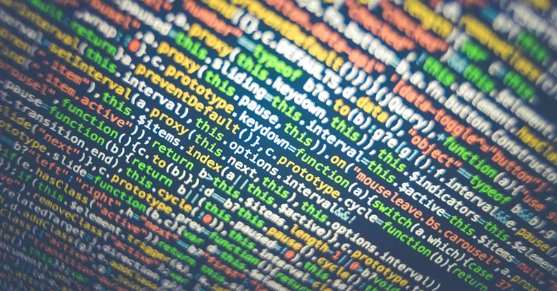 Vibrant multicolored source code displayed on a computer screen, depicting programming and web development concepts.