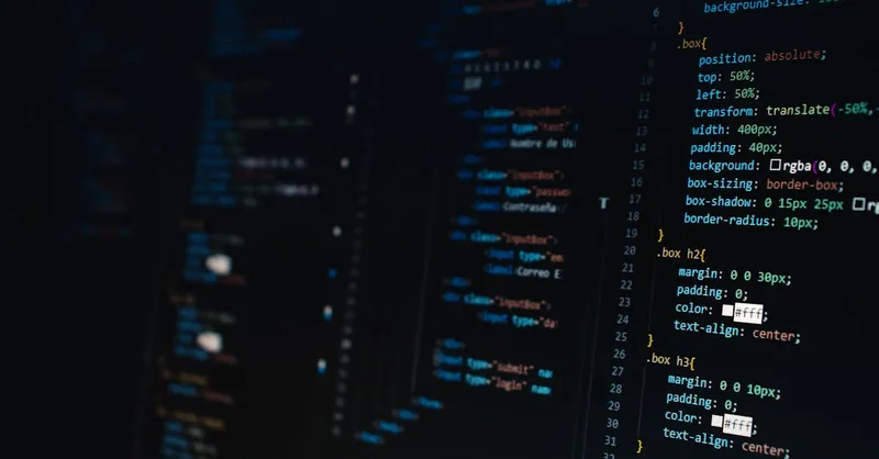 Detailed view of HTML and CSS code on a dark screen, representing modern web development.